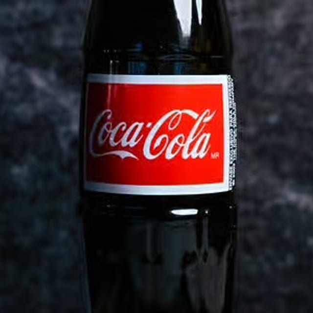 Coca 1/2 Litro.